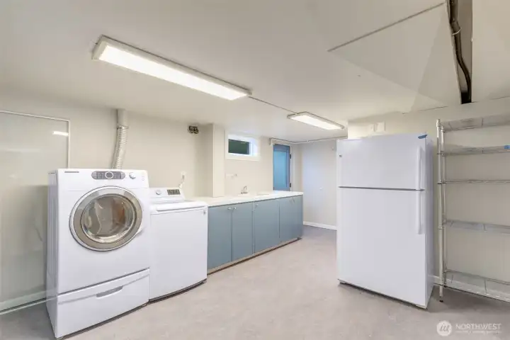 Laundry room with more storage and an extra fridge for convenience! Laundry room with more storage and an extra fridge for convenience!