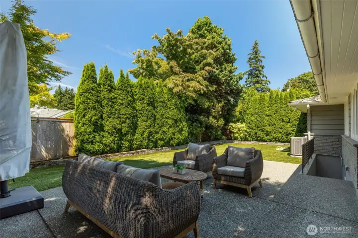 Western facing backyard. Staircase to the lower level. Western facing backyard. Staircase to the lower level.