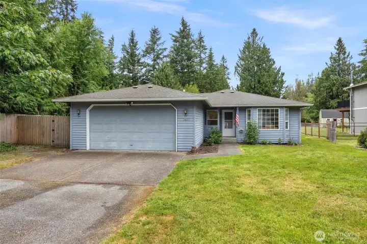 Front of home - Lots of parking in garage, sideyards and driveway