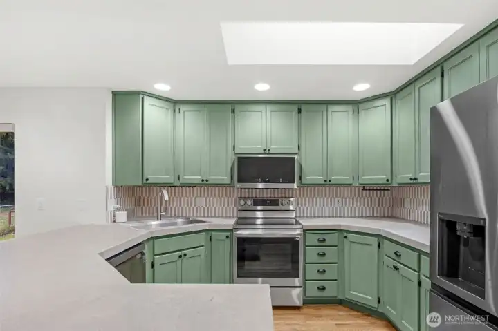 Updated concrete counter tops and painted  cabinets