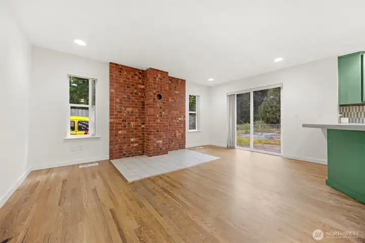 Large eating area with slider towards back patio area