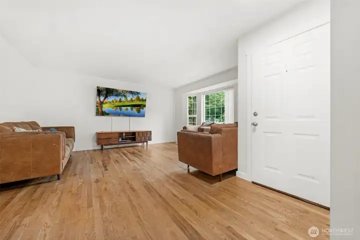 Looking back at front door with living area