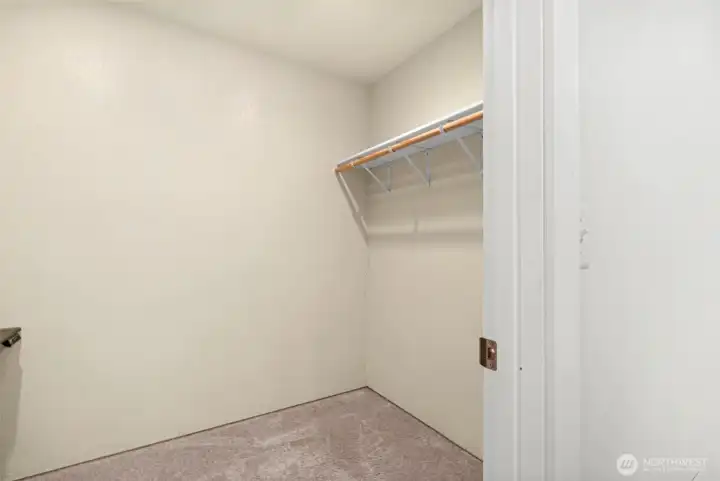 Huge walk in closet in primary bedroom