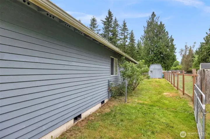 Right hand side of home sideyard access