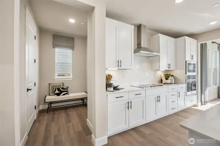 Photos are of a previous model home. Colors and finishes will vary.