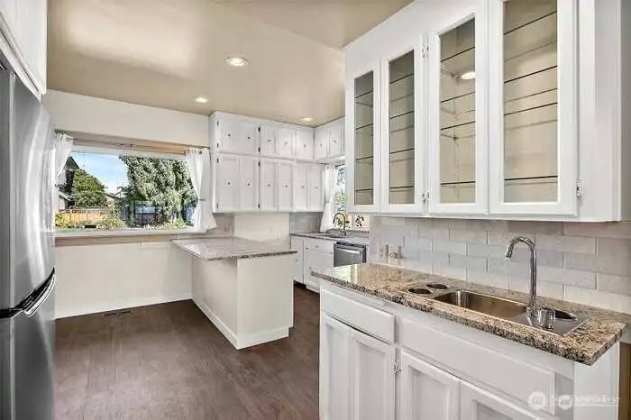 Beautiful Cabinetry throughout Kitchen provides an abundance of storage - Also room for Counter Seating Beautiful Cabinetry throughout Kitchen provides an abundance of storage - Also room for Counter Seating