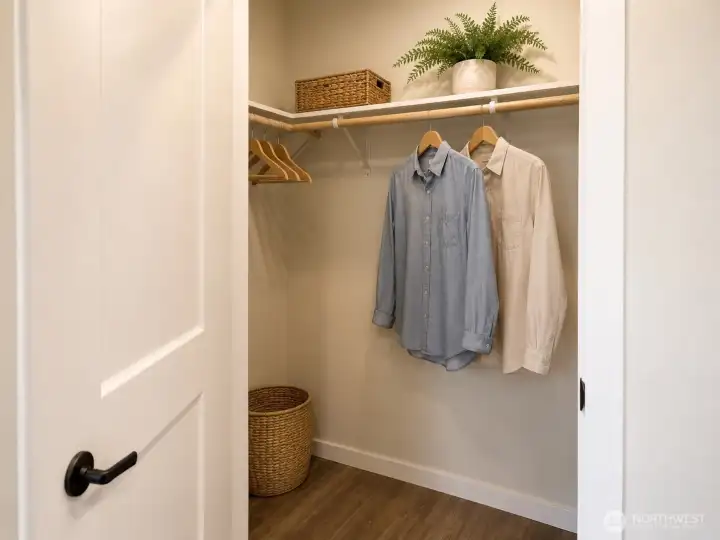 Primary Closet *AI Staging* Primary Closet *AI Staging*