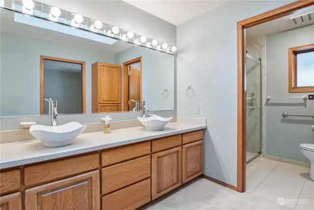 Large vanity and linen storage.