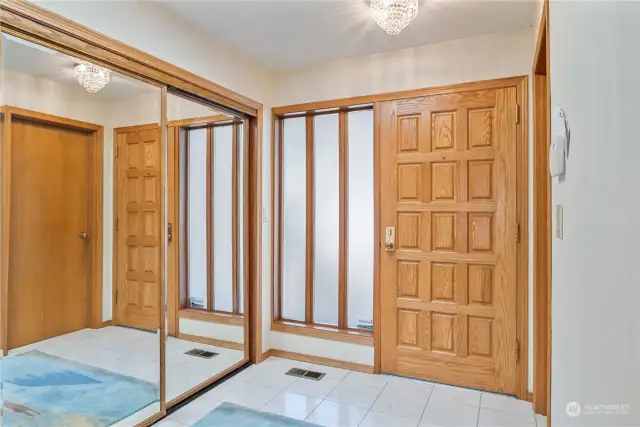 The spacious entry features and large closet and direct access to the garage.