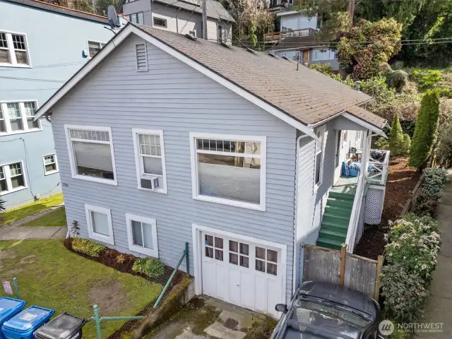 The duplex has a one car garage and a secluded backyard area.