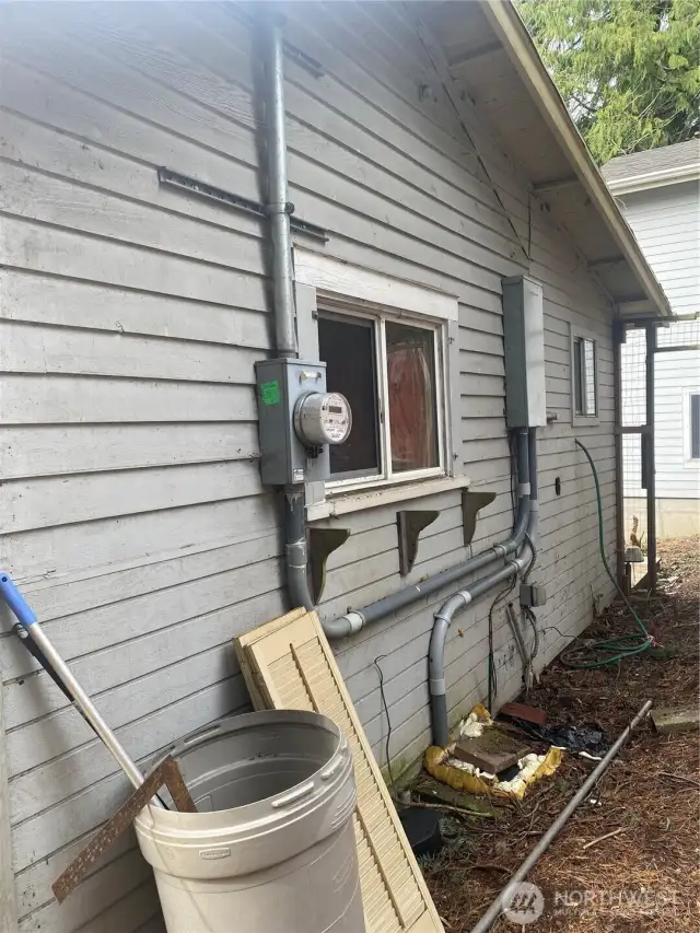 Switch boxes at rear of houses.