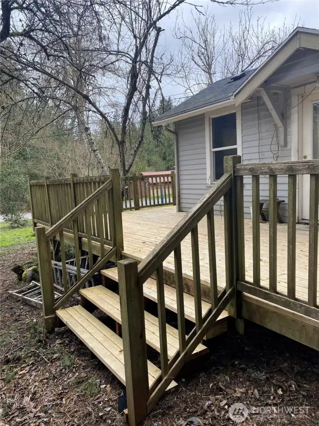 South stairs to deck and front door.