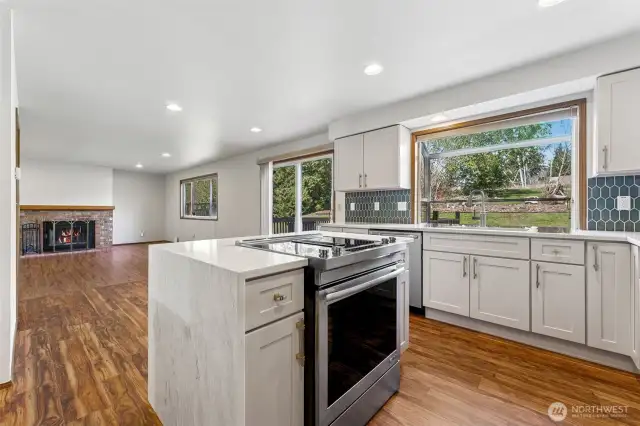 The kitchen is open to a casual dining area and the family room.