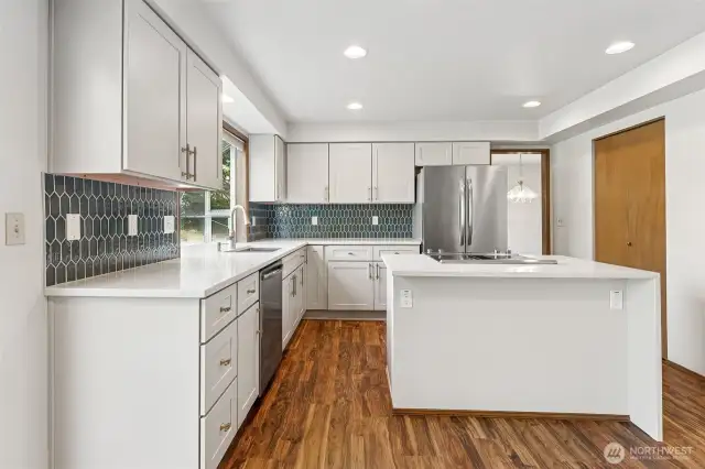 The walk-in pantry provides generous storage, keeping everything neatly organized and within reach