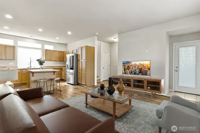 Family room off kitchen on main. Virtually Staged