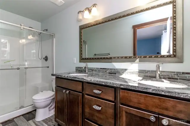 Granite Counters, walk in shower, and tile floors.