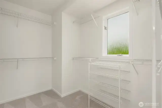 primary bedroom walk in closet