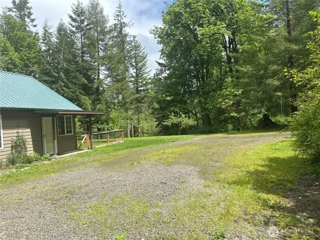 Large parking area with room for garage.
