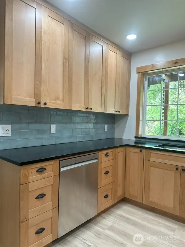 Custom cabinets and Quartz counter tops.