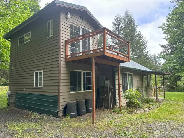 Cover entry with private deck off master bedroom.