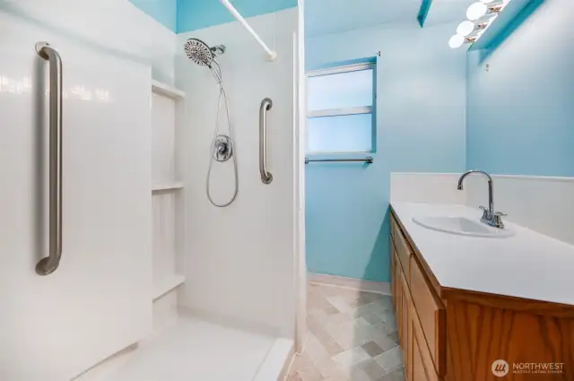 Main Bath with Walk In Shower. This can be converted back to a full bathtub.