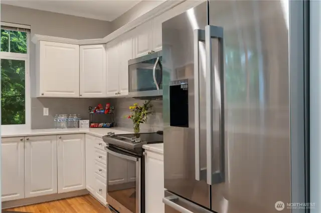 Stainless steel appliances in this gorgeous Kitchen are not the only perk. They are quality Bosch, and Whirlpool, adorning a fridge capacity for any chefs dream.