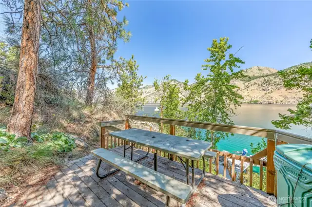 Picnic Table on Deck before Dock on Trail