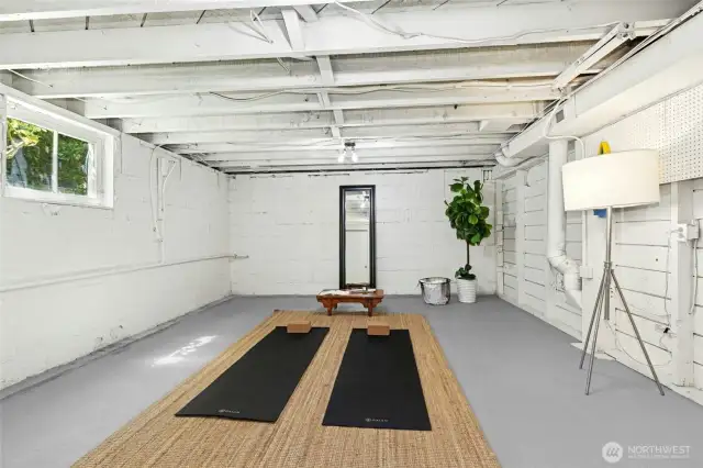 The unfinished area of the basement has so many options - or keep for storage, laundry and work out space.