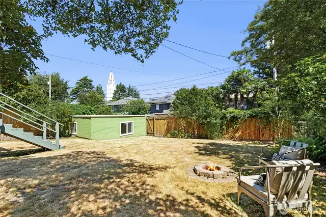 A one car garage is found in the level backyard and is accessed from the alley. Just add a play structure or trampoline !