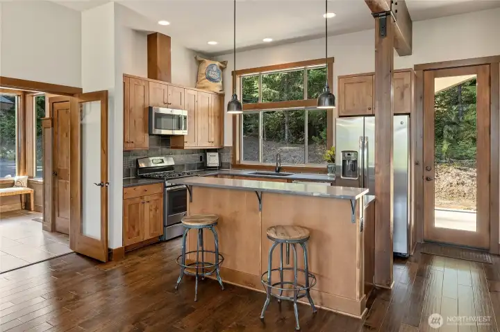 Kitchen with eating space and door to front patio