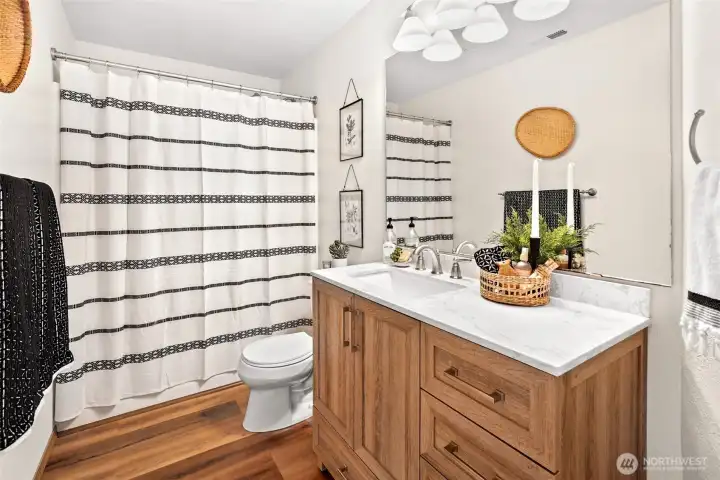 Updated full bathroom on main level.