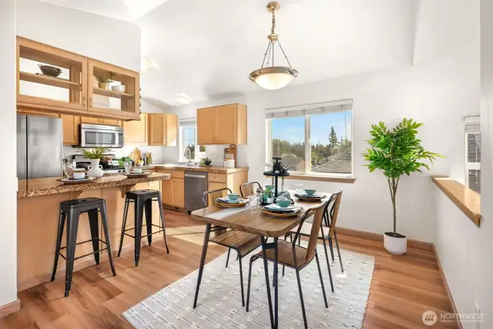 Open concept dining room, right next to kitchen.