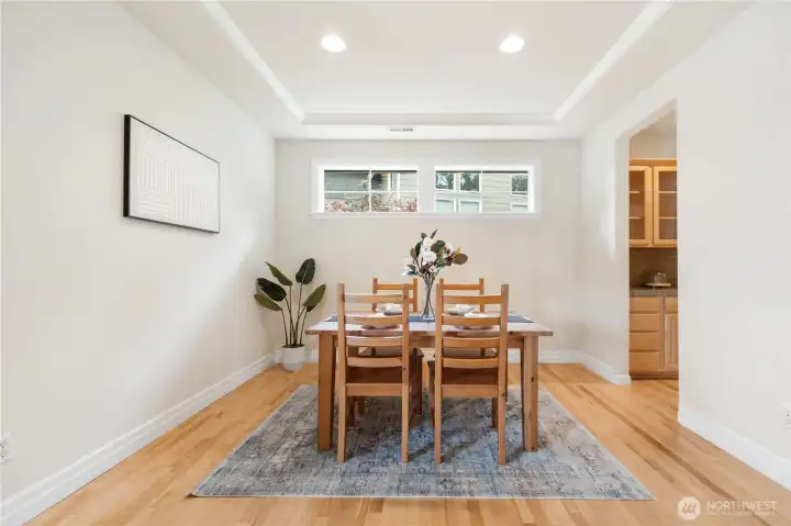 Formal dining room with loads of natural light.
