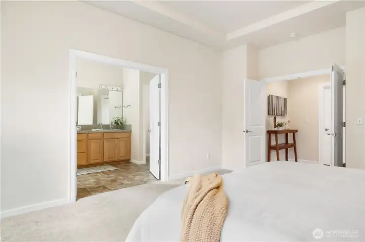 Double doors for both the entry and the bathroom.