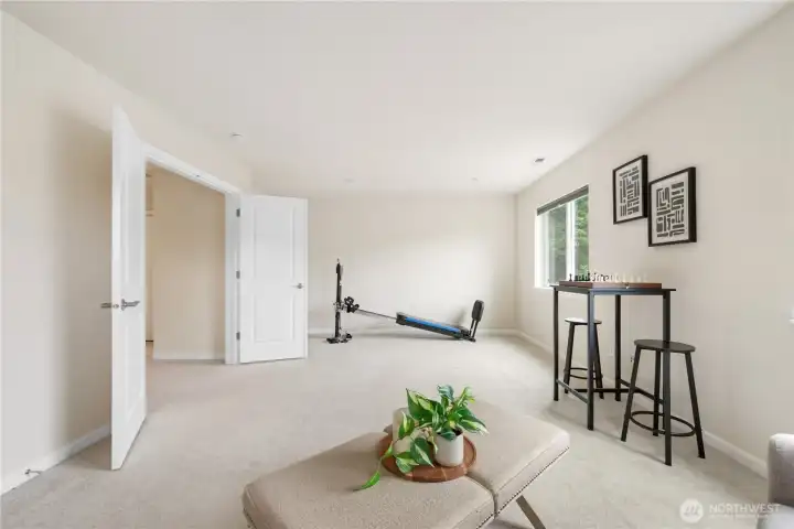 French doors and a spacious closet just behind. Use this as a bedroom, game room, home gym, or hobby room! Lots of possibilities.