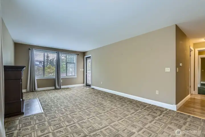 The automatic blinds will keep things cool during the late summer sun.  The door leads to a wonderful deck with new flooring and railings.