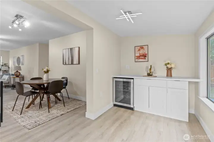 Entertaining area with beverage fridge and extra cabinet space