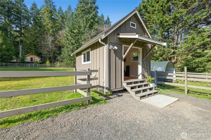 Heated bonus studio adds flexible, year-round space just off the north pasture, ideal for a studio, office, or hobby workspace. Set within the fenced equestrian area, it offers convenient functionality while keeping you close to the day-to-day rhythm of the property.