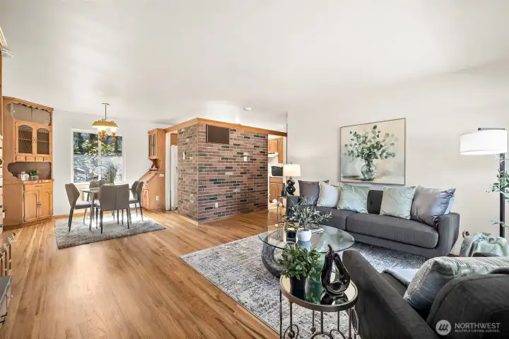 Once inside you are greeted by freshly refinished stunning oak hardwood floors and open living spaces.