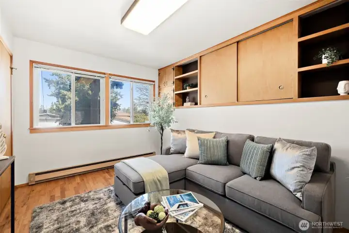 Family room has built ins as well providing abundant storage