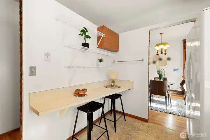 Kitchen with built in bar and more storage