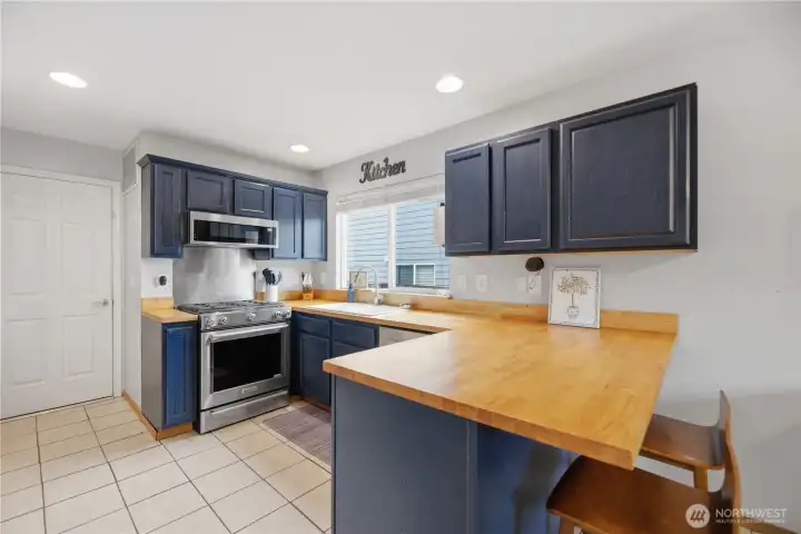Kitchen with pantry, stainless appliances