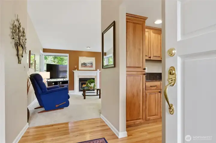 The home welcomes you into a bright living room, with the kitchen conveniently located to the right. Enjoy easy, single-level living—no stairs, no worries.