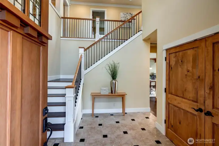 As you walk in, the openness and natural light immediately stand out. The staircase and railings add a touch of character, while the layout feels both functional and welcoming.