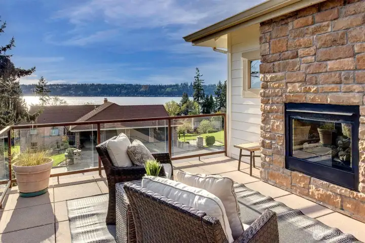 This expansive deck truly lives like an extension of the home-an inviting outdoor living space where you can relax, entertain, and enjoy the view year-round.