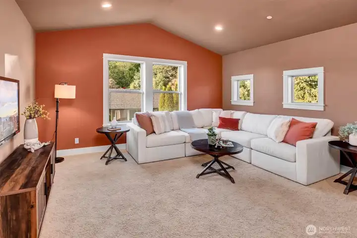 A flexible space that can easily adapt to your needs. With vaulted ceilings, abundant natural light, and a comfortable layout, this bonus room is perfect for a media space, game room, or additional living area.