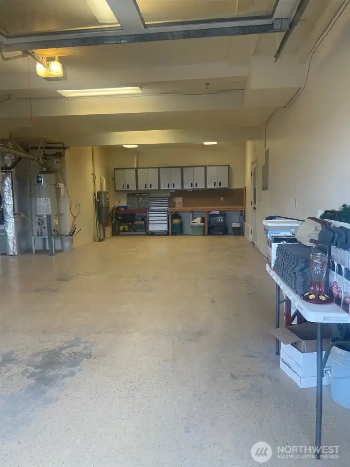 Fits 4 cars tandem style or 2 cars with a huge shop in the back