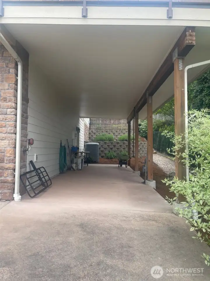 32 ft. covered carport on the side of the house (you can't really see it when you are facing the house)