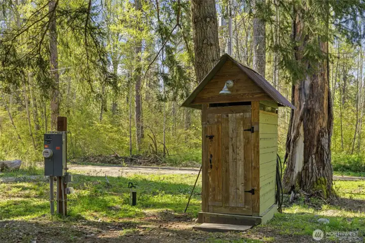 Shabby chic composting toilet adds the perfect rustic touch.