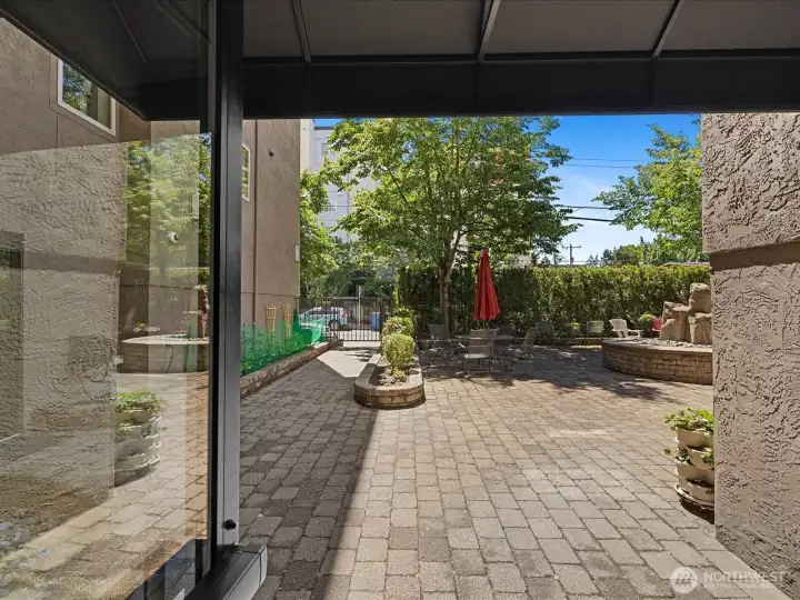 The courtyard is gated and the front door is locked for security.